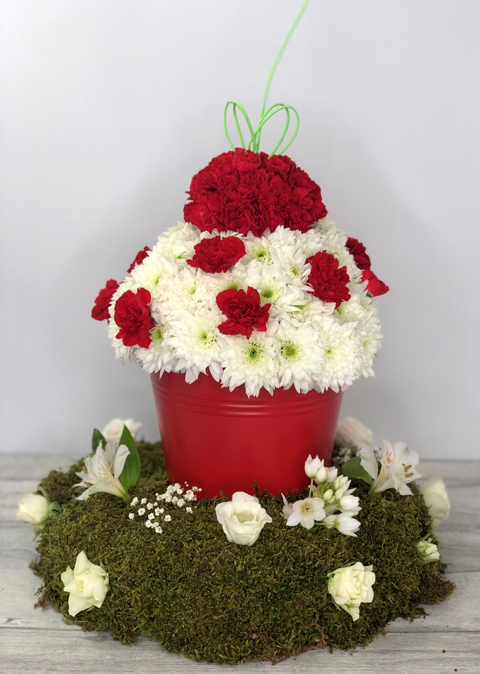 <h2>Bespoke Cherry Cupcake Tribute | Funeral Flowers</h2>
<ul>
<li>Approximate Size W 30cm H 45cm</li>
<li>Hand created white cupcake complete with a cherry on the top</li>
<li>To give you the best we may occasionally need to make substitutes</li>
<li>Funeral Flowers will be delivered at least 2 hours before the funeral</li>
<li>For delivery area coverage see below</li>
</ul>
<br>
<h2>Liverpool Flower Delivery</h2>
<p>We have a wide selection of Bespoke Funeral Tributes offered for Liverpool Flower Delivery. Bespoke Funeral Tributes can be provided for you in Liverpool, Merseyside and we can organize Funeral flower deliveries for you nationwide. Funeral Flowers can be delivered to the Funeral directors or a house address. They can not be delivered to the crematorium or the church.</p>
<br>
<h2>Flower Delivery Coverage</h2>
<p>Our shop delivers funeral flowers to the following Liverpool postcodes L1 L2 L3 L4 L5 L6 L7 L8 L11 L12 L13 L14 L15 L16 L17 L18 L19 L24 L25 L26 L27 L36 L70 If your order is for an area outside of these we can organise delivery for you through our network of florists. We will ask them to make as close as possible to the image but because of the difference in stock and sundry items it may not be exact.</p>
<br>
<h2>Liverpool Funeral Flowers | Bespoke Tributes</h2>
<p>This cupcake has been loving handcrafted by our expert florists and features a mass of white spray chrysanthemums, together with red carnations to make the cherry on top and a red tin cupcake case. An ideal funeral tribute for someone who loved cupcakes, or someone who liked baking.</p>
<br>
<p>Bespoke Funeral Tributes are a way to create a tribute that is truly unique and specially designed for a loved one.</p>
<br>
<p>These are sometimes selected by family members as the main tribute or more often a group of friends or workplace colleagues as a symbol of things they associate with the deceased.</p>
<br>
<p>The flowers are arranged in floral foam, which means the flowers have a water source so they look their very best for the day.</p>
<br>
<p>Containing white double spray chrysanthemums, red carnations, moss-covered base with white seasonal flowers such as spray roses, alstroemeria, lisianthus, chincherinchee and gypsophila. </p>
<br>
<h2>Best Florist in Liverpool</h2>
<p>Trust Award-winning Liverpool Florist, Booker Flowers and Gifts, to deliver funeral flowers fitting for the occasion delivered in Liverpool, Merseyside and beyond. Our funeral flowers are handcrafted by our team of professional fully qualified who not only lovingly hand make our designs but hand-deliver them, ensuring all our customers are delighted with their flowers. Booker Flowers and Gifts your local Liverpool Flower shop.</p>
<br>
<p><em>Debera G - 5 Star Review on yell.com - Funeral Florist Liverpool</em></p>
<br>
<p><em>Fleur and her team made the flowers for my Dad's funeral. I knew I wanted something quite specific but was quite unsure how to execute the idea. Fleur understood immediately what I was hoping to achieve and developed the ideas into amazingly beautiful flowers that were just perfect. I honestly can't recommend her highly enough - she created something outstanding and unique for my Dad. Thanks Fleur.</em></p>